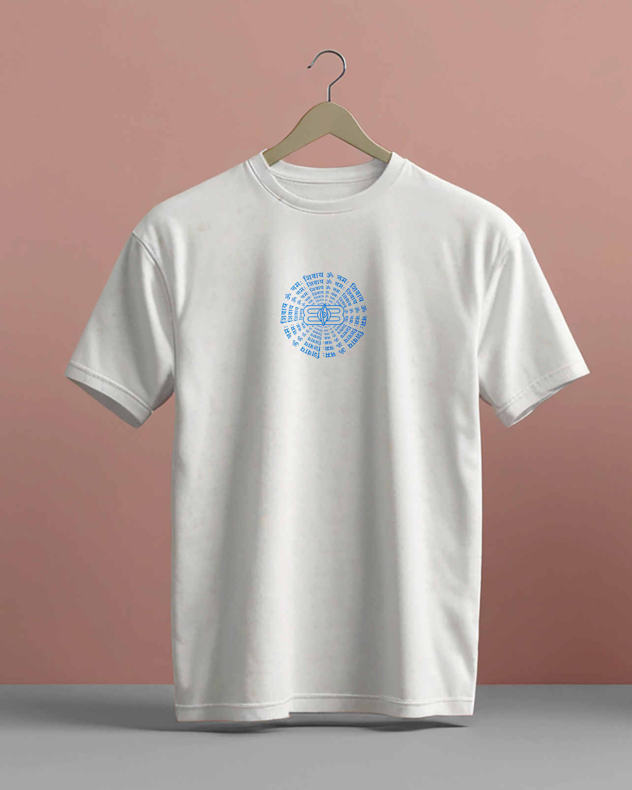 White t-shirt with blue Shivay design on a hanger against a pink background

White Unisex oversize T-shirt 240 GM 100% cotton, Krypton Studio India Online